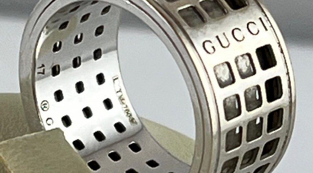 Weißgoldener Drehring GUCCI