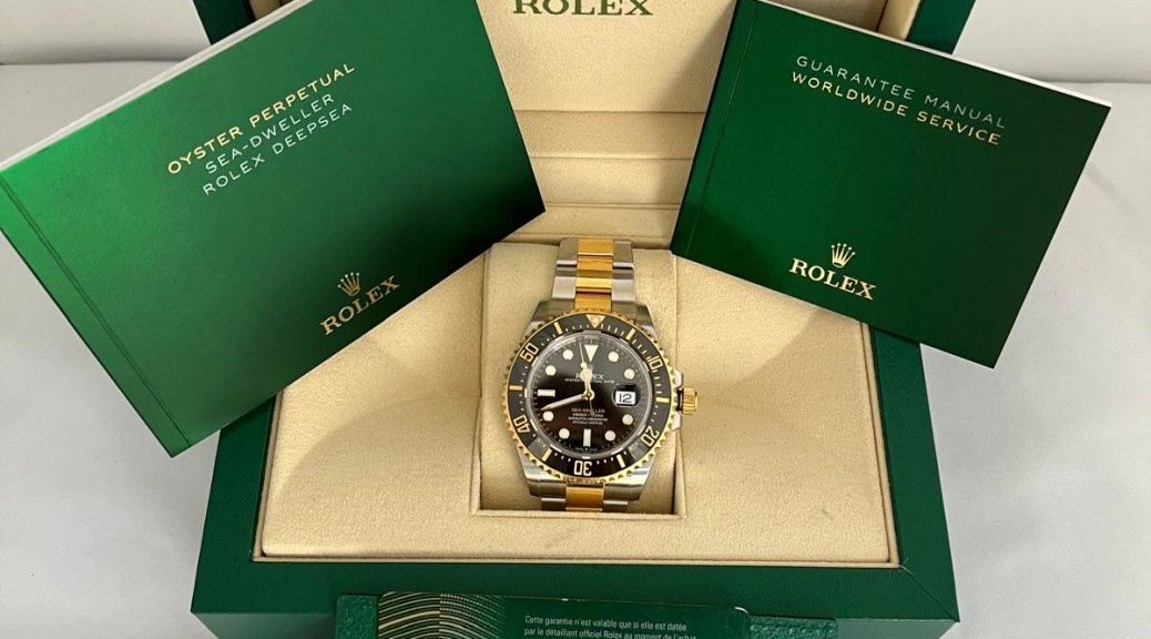 Stahlgoldene Herrenarmbanduhr ROLEX Sea Dweller